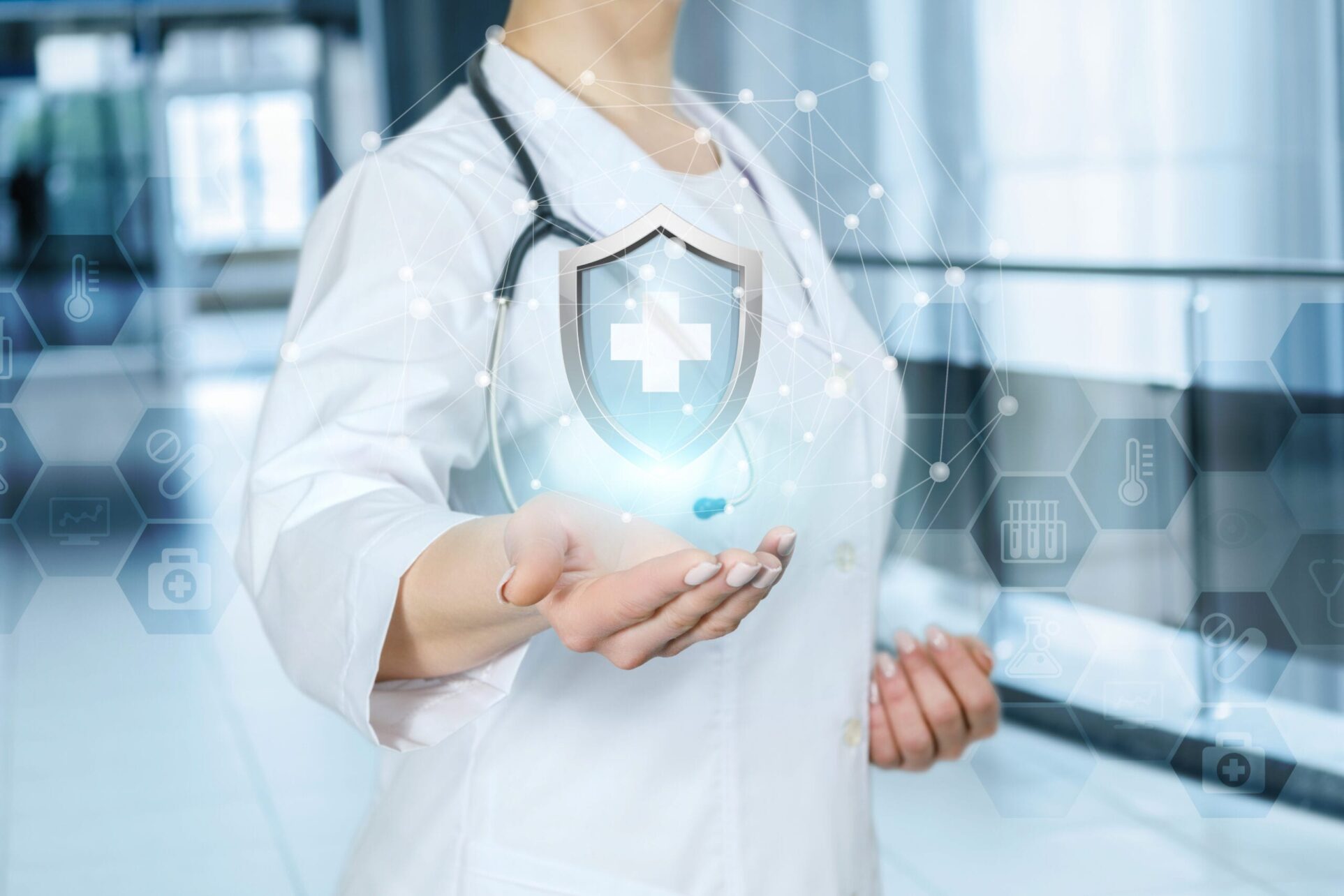 A doctor is showing a shield with medical symbol inside. nurse